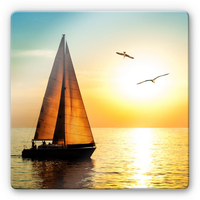 Glasbild Segelboot im Sonnenuntergang